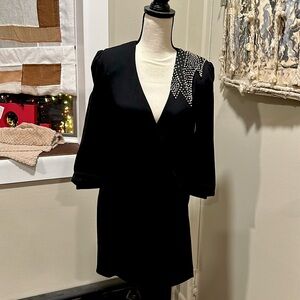 Saint Laurent stunning black wrap mini dress
Gorgeous crystal appliqué shoulder